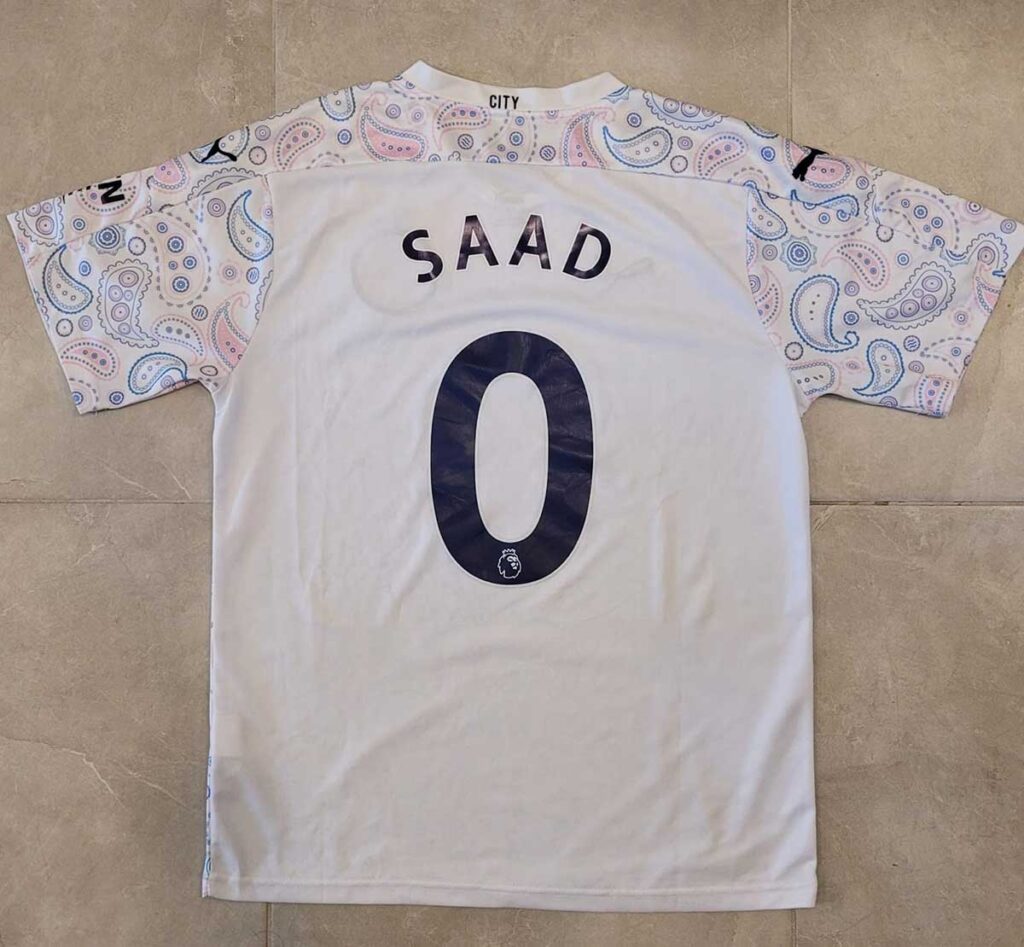 soccer jersey with the name saad and number 0 on the back
